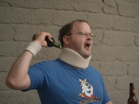 cinematic photo of  <lora:Tourettes_Guy:1> Tourettes Guy with a white neck brace and glasses in a blue shirt is throwing beer bottles at a wall, 35mm photograph, film, bokeh, professional, 4k, highly detailed