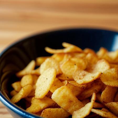 A close-up of crispy, golden honey butter chips piled high in a bowl. Each chip has a delicate sheen from the sweet honey glaze, with specks of buttery goodness visible on the surface. The edges of the chips are slightly curled and crispy, with a perfect balance of salty and sweet flavors. The setting is cozy and inviting, with warm, soft lighting reflecting off the chips, evoking a comforting snack-time atmosphere.