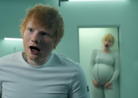 Edsheeran person in an alien spaceship medical ward being treated by bizarre pregnant cyborg women who think he is pregnant. ((screaming edsheeran person)). Science fiction lighting and style. Scene from /"Aliens"/