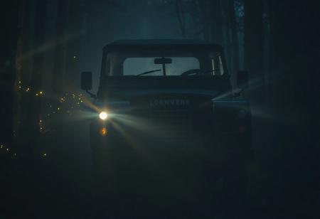 vintage Land Rover Series I parked on a forest trail at night, surrounded by dense fog, soft cinematic lighting from the car’s headlamps, fireflies glowing in the background, eerie atmosphere, film noir look, adventure mystery vibe, dusty windshield, mist in beams of light
--ar 21:9 --v 5 --q 2
<lora:cinematic_night_scene:0.7> <lora:classic_cars_vintage_adventure:0.8>