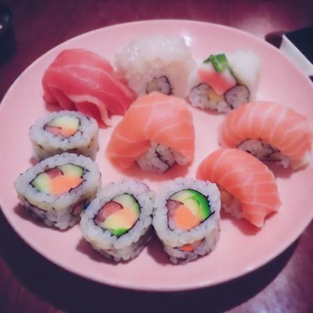 sushi, food photography <lora:pastel pink babycore:0.8> pastel pink babycore