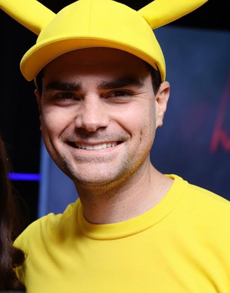 Closeup of benshapiro person wearing a yellow Pikachu costume and making a shocked facial expression.