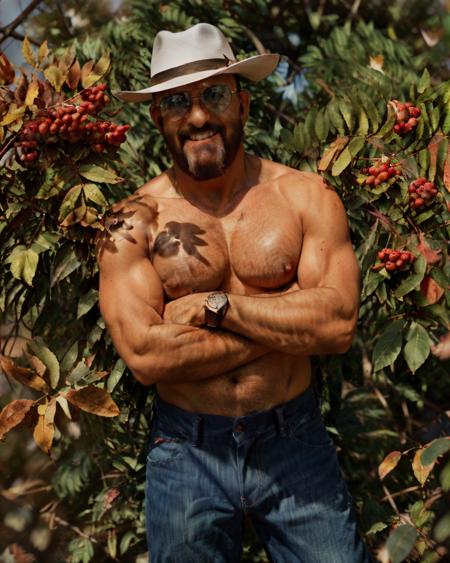 shufutinskiy man, athletic, muscular, big biceps, big shoulders, tan, naked torso, jeans, white hat, bald, sunglasses, smile, (look in camera:1.00), full body, autumn leaves, (ryabina branch and small red berries:0.8) on background, sunshine, kodak portra 400, film grain, muted colors, bokeh <lora:3rd_september_v1:1.0> <lora:AdvancedEnhancer:1.0>