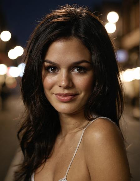 high resolution photo of rchbls woman, dark long hair,close-up,dimly lit,smile,gloomy,volumetric lighting,cinematic,film grain,realistic skin,pores,front view,depth of field,street background