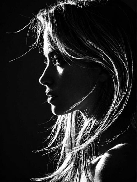 Portrait of a woman, black and white, backlit, silhouette, lines