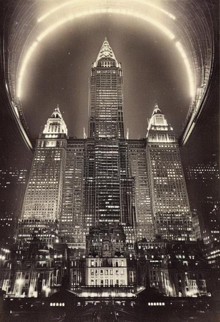 ()Hyoer Realistic:2.0)Polaroid picture 
an image of 
New York City, 1920s - Amid the city's soaring ambition, the architects of Grand Central Terminal, Reed and Stem, and developer William Wilgus, conceived a truly audacious plan - to construct a towering 68-story skyscraper directly above the terminal's iconic Beaux-Arts façade.
Envisioned as a magnificent steel and glass monolith reaching over 1,000 feet into the sky, the Grand Central Terminal Tower would have dwarfed even the Chrysler and Woolworth Buildings. Its observatory deck would have offered breathtaking panoramic views, while the upper floors were slated to house luxury apartments and offices for New York's elite.
The Grand Central Terminal Tower remains an intriguing "what if" - a glimpse into a bold, alternate reality where New York's skyline was forever transformed by this unrealized wonder. Its absence leaves us to ponder the paths not taken and the dreams left unbuilt, a reminder that even the grandest visions can be ephemeral