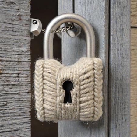 A padlock made out of wool, (best quality, 4k, photorealistic, HD, UHD, HDR), w00len