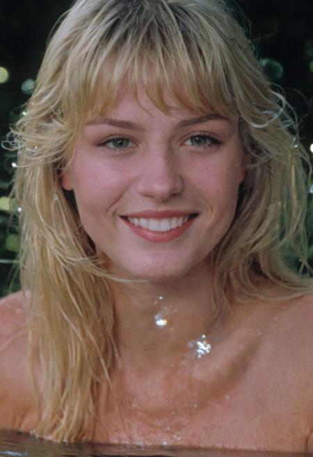 A female model, blonde hair, shot hair, in swap wayer, swamp, Lili pads, fireflies, smiling, half in water, detailed, DSLR, UHD, the 1980s, VHS footage.