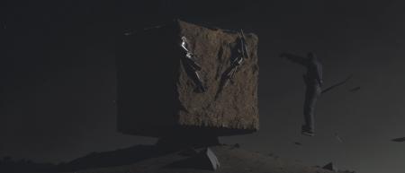 <lora:21Cube:1>levitating cube scenario: a statue of a man standing on top of a pile of dirt