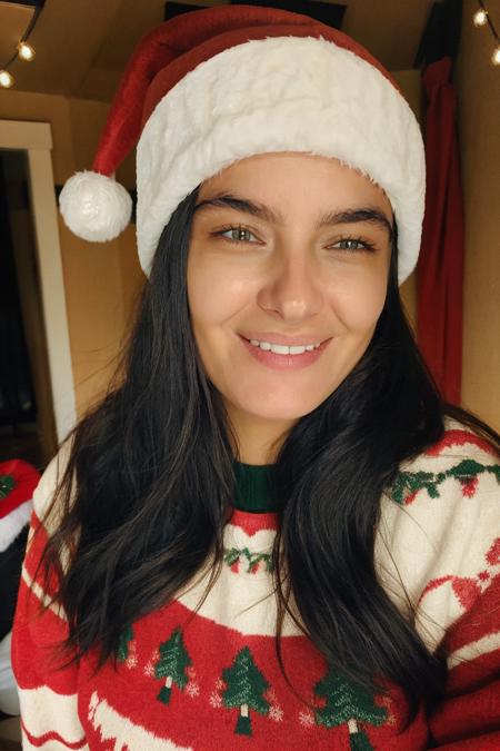 a woman in an ugly sweater and santa hat, Christmas, in a cozy room, sweet smile, detailed face, soft lighting, (high detailed skin:1.1)
<lora:alanna_masterson_lora_v01:1> alimas