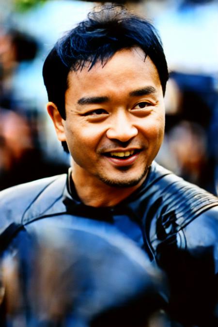 photo of lesliecheung with ironman armor, masterpiece, best quality, solo, portrait, (high detailed skin:1.2), 8k uhd, dslr, soft lighting, high quality, film grain, Fujifilm XT3,<lora:lesliecheung_v4:1>