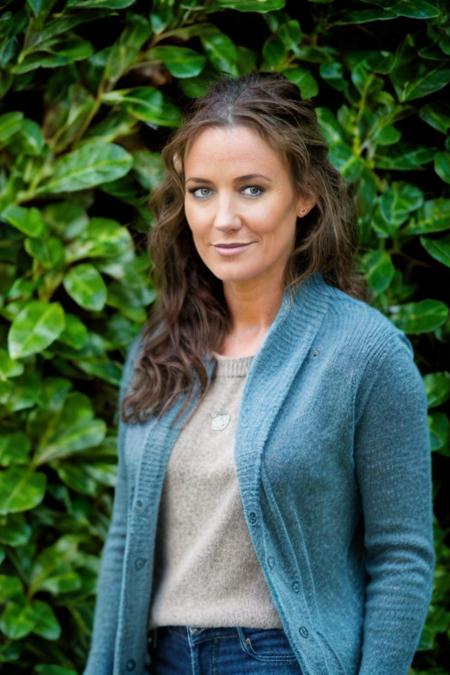 <lora:Orla_Brady:1> masterpiece, best quality, 1girl, solo, o1873b, brown_eyes, realistic, brown_hair, long_hair, posing, walking through a A secluded cloister with ivy-covered arches  wearing a pale turquoise jumper and blue jeans