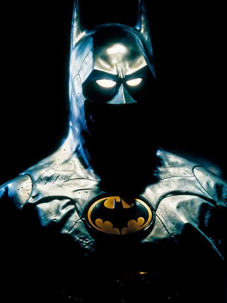 A photo of Batman at night, photographed by Steven Meisel on a medium format camera, blue lighting, high ISO, (film grain:1.2) <lora:Batman89:0.8>