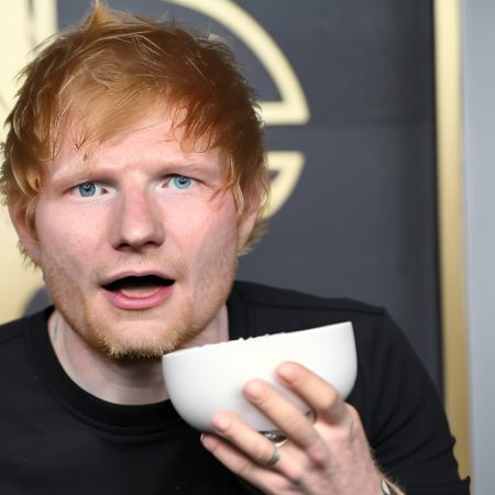 Edsheeran person ((smashing a cup):1.5) on the counter at Birch Coffee. ((angry pissed off facial expression)). paparazzi photograph.