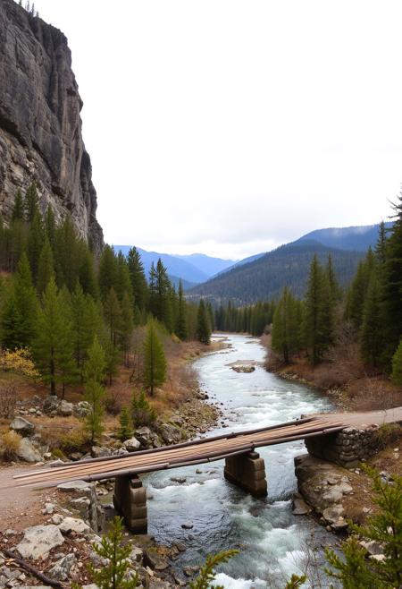 The image depicts a serene, natural landscape dominated by a dramatic rock formation on the left, its rugged face partially covered by a sparse growth of pine trees. The trees extend down the slope, gradually becoming denser and exhibiting a mix of green and subtle autumnal hues as they recede into the valley. A rustic wooden bridge spans a clear, fast-flowing river that winds its way through the foreground, its surface reflecting the overcast sky. The bridge appears well-worn, with stone supports grounding it to the riverbanks. Beyond the river, the valley stretches into the distance, with layers of tree-covered mountains fading into a misty horizon under a soft, diffused light from the cloud-laden sky. The overall atmosphere is tranquil and remote, suggesting an untouched wilderness.