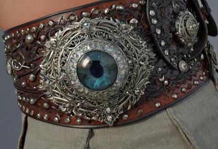 score_9, score_8_up, score_7_up, score_6_up, score_5_up, score_4_up,<lora:Fant5yP0ny:0.8>, Man's Belt, This large wide belt is studded with rubbery teeth and has an almost tacky feel.  A single grotesque eye-like gem serves as a buckle for this belt.