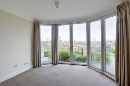 wide angle photo, ovfi, view through window, residential neighbourhood, london, bay windows,  large windows, <lora:buildings view from indoors_epoch_9:0.5>, <lora:add_detail:0.5>, RAW photo, 8k uhd, dslr, soft lighting, high quality, film grain, Fujifilm XT3, lr