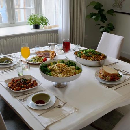 photo of food on a dinner table in a living room