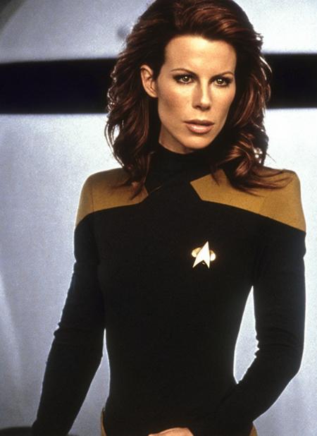 bokeh, A stunning intricate full color portrait photo of Kate Beckinsale,
wearing a (strtrk uniform), interior ship background,
(sitting in the captain chair on the spaceship),
epic character composition in star trek world,
by ilya kuvshinov, alessio albi, nina masic,
sharp focus, natural lighting, subsurface scattering, f2, 35mm  <lora:startrek_uniform_lora_5000:1.35>