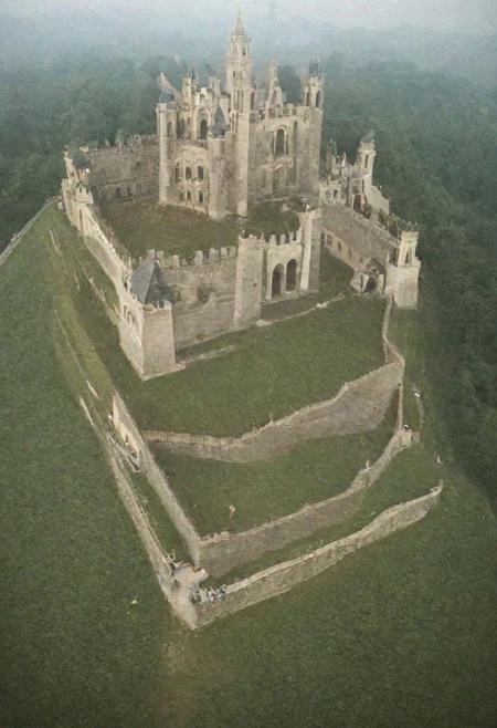 (The main castle, the center of the kingdom,urban landscape:1.5),
(a changing skyline, towering spires, thick walls, and extremely huge scale:1.4).
(statue, monument, square, fountain, cloister, central axis:1.3),
(extra huge Cathedral:1.1),
(easy to defend and difficult to attack in the spectacular natural landscape:1.2),
(Renaissance, Neoclassical, Baroque, Rococo, brutalist architecture:1.2),
(elegant, classic:1.2),
(dark fantasy style:1.1),(creeping fog:0.9),
(rich white and gold colors:1.4), (harmonious colors:1.0),
(real landscape:1.1), (blurred background:1.0),
(buildings|BREAK|trees|BREAK|Crowd|buildings|BREAK|trees|BREAK|Crowd|buildings|BREAK|trees|BREAK|Crowd:0.5), 
[(background, more_details:0.3), (more_details:0.6), (more_details:0.9), (more_details:1.2):0.65],[:traffic|windows|railing|stair|balcony|terrace|crowd|Sidewalk|vehicle|trees|equipment| detailed signal_details:0.7], [:marble|granite|lbrick|tile|metal|concrete|glass|foliage_material texture:0.7], (real landscape:1.1), (blurred background:1.0), [buildings|BREAK|trees|BREAK|Crowd|buildings|BREAK|trees|BREAK|Crowd|buildings|BREAK|trees|BREAK|Crowd:0.7], [(background, more_details:0.3) 
easynegative, BadDream, great lighting, extrusionbuilding, void, hillscastel, mayamaze