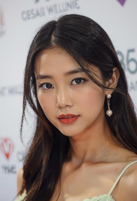 A captivating shot of a young woman with long, dark, flowing hair parted in the center, elegantly framing her face. Her skin appears smooth and radiant, and her makeup is subtle yet enhances her features, with a focus on her eyes and lips. She is wearing delicate, dangling earrings with pearl-like accents. Her attire seems to be a light-colored, possibly sheer or layered gown with thin straps and subtle embellishments in a soft, pastel green hue around the neckline. The background is a clean, bright white, with hints of text or logos that are slightly out of focus, suggesting a formal event or photoshoot setting. The lighting is soft and even, highlighting her gentle expression and poised demeanor. Capture the serene and graceful essence of this individual in a high-resolution image with meticulous attention to detail in her hair, makeup, and the texture of her garment. The overall mood should be one of quiet elegance and understated beauty. Pay close attention to the subtle interplay of light and shadow on her face and clothing to create depth and dimension. The focus should remain sharply on the woman, with the background softly blurred to emphasize her presence.