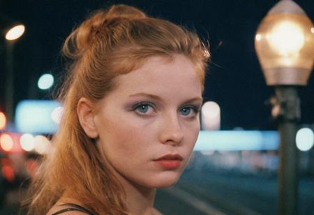 analog film photo ((EuroBabe 80sPortrait)), ginger, blue eyes, makeup, (street lights), outdoors, (film grain:1.5) . faded film, desaturated, 35mm photo, grainy, vignette, vintage, Kodachrome, Lomography, stained, highly detailed, found footage