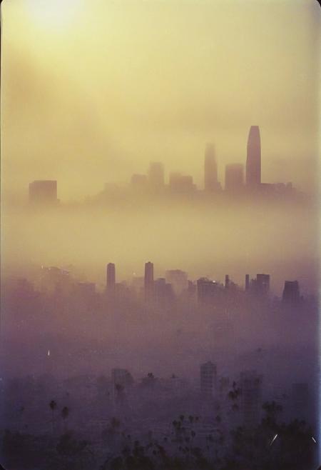 ()Hyoer Realistic:2.0)Polaroid picture 
an image of 
A breathtaking photograph of the early morning dawn in San Diego, California. The golden sun peeks through the clouds, casting a warm glow over the city. (The skyline is dotted with towering skyscrapers that are shrouded in a delicate mist:2.06). The Pacific Ocean is seen in the distance, with gentle waves rolling towards the shore. The atmosphere is serene and peaceful, reflecting the beauty of nature at the break of day.