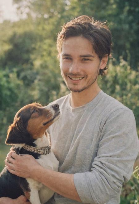 cinematic film still fashion photography portrait of 1man with cute dog as companion, headshot, sunlight , Fine Art & Beauty Photography – ,,light diffraction in frame, dreamy,hazy look.  Helios 44-2 lens mounted on a Praktica MTL 5B Helios 44M-4 lens, 58mm f/2,   in a garden. authentic happy smile towards camera, <lora:hand 4:0.3>