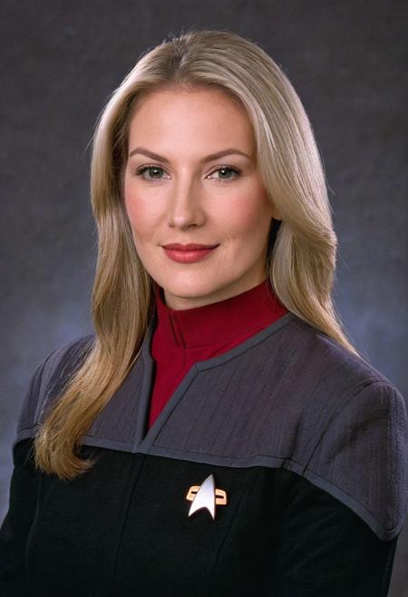 photo portrait of a 28yo ((white woman)), blonde hair, messy, beautiful, (black and grey ds9st uniform), red collar, long sleeves, medium hair,
<lora:DS9XLVGRAD3:0.8>