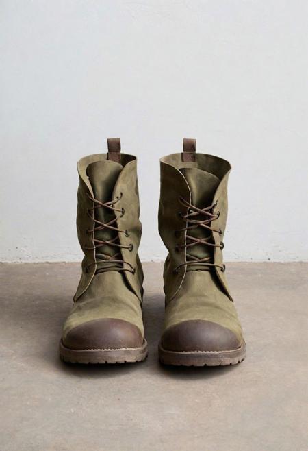 A plain, everyday visual of a minimalist, large, brutish ogre wearing dull, matte, oversized boots made of plain fabric, with simple designs, on a mundane, earthy, narrow path. Basic, flat art, practical design, wide shot, simplistic, lacking color depth, understated, direct overhead lighting, monochromatic background, with minimal details, plain colors, matching colors, shallow color, realism, traditionalism, low resolution, clear focus, mundane, colorless, simplistic, elemental, rugged, inelegant, basic, earthly, unremarkable, water-like, minimalist, hologram-free, ogrecore, industrial