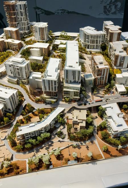 (Hand-made architectural model, in the studio, reduced scale, overlooking the entire town, model trees, moA high-rise building in  urban , model TRAIN, model characters, detailed, tilt-shift photography), 
(Large Files, Ultra Realistic, 8K, 16k, FHD, HD, VFX, Perfect, Photography, composition, Architecture Sales Photography, Architecture Competition, Ultra High Resolution, Cinematography, High Resolution Image:1.1), (dramatic lighting, direct sunlight, ray tracing, clear shadow:1.2),  (real landscape:1.1), (blurred background:1.0), (urban background, more_details) ,
great lighting, extremely detailed, clear, rowhouse, handmademodel