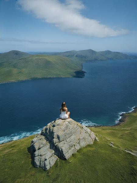 realistic, aerial photography, sky, scenery, ocean, 1girl, sitting, <lora:ap1-000024:0.8>