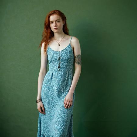 RAW full body analogue photo of a beautiful 20 years old woman, clear focus, 8K,__Random_Woman__,Sustainable: Eco-friendly tattoos, recycled rings, natural necklaces, gentle gaze, natural makeup, sustainable clothing, eco-friendly shoes, minimal piercings, natural, hemp dress. ,low light, soft natural light, Rembrandt style light, Hasselblad DLSR camera, 200mm Zeiss lens, f/2.8, ,Sexy pose, erotic pose, exhibitionism