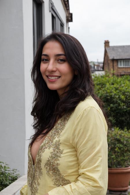 selfie candid amateur photo, pakistani woman, cleavage,  <lora:mvcleavage:0.5>, wearing longsleeeve embroidered cotton yellow kameez, garden, london, terraced houses in background, residential neighbourhood, smile, blushing, coy, playful, flirting, laughing, looking away, side view, <lora:add_detail:0.5>, RAW photo, 8k uhd, dslr, soft lighting, high quality, film grain, Fujifilm XT3