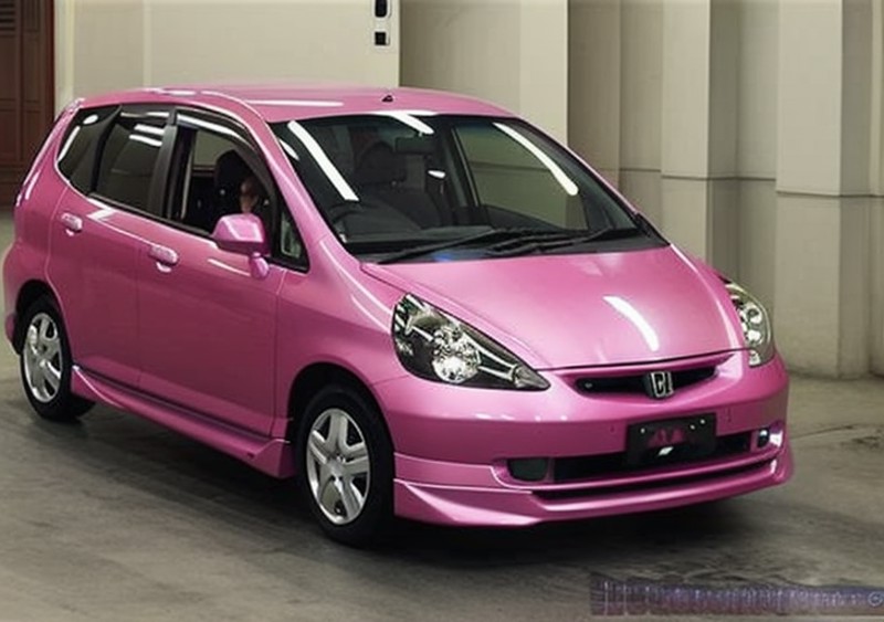 a pink honda in a chinese city, night, award winning picture, photorealistic