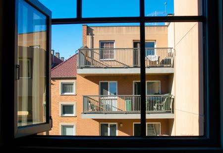 The window balcony structure of the apartment building is viewed from the outside