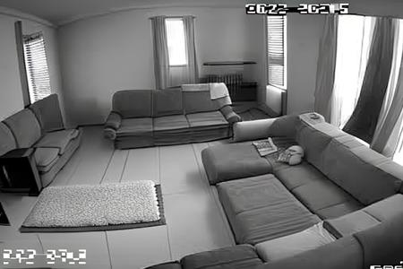 a living room night wision, couch, table, tv style_cctv