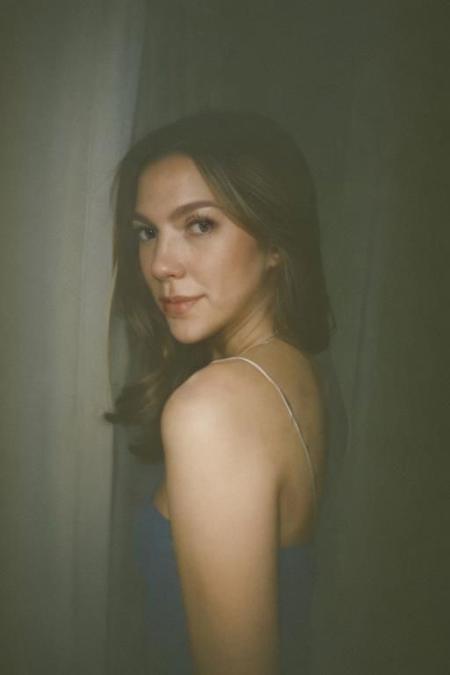 analog portrait photograph of a feminine french woman, dark room, Porta 160 color, shot on fujifilm, canon eos R