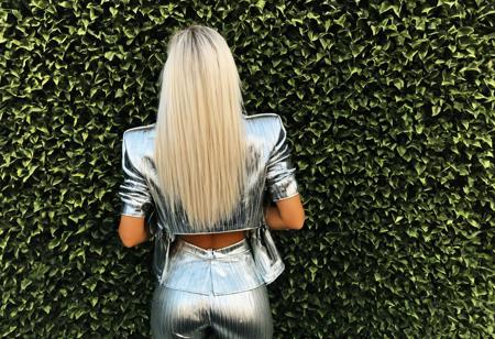 lgngshnyft 1girl realistic solo midriff, from behind, holding phone, open jacket, leaning forward, black pantyhose 24 year old, flat chest, Silver textured hair, caucasian, blue eyes, fair skinned, best quality, RAW photo, subject, 8k uhd, high quality, photorealistic, fair-skinned female, tanned, affluent, majestic, Splendid, # Originally sourced from https://aiartcreation.fandom.com/wiki/Modifier_Taxonomy#Photography/Film, affluent, Dutch angle <lora:lgngshnyXLrd:0.8>