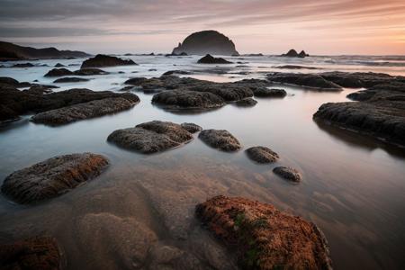 raw photo, a sunset landscape, oregon coast, tide pools, beach, forested cliffs, cozy, photorealistic, high detailed texture, 8k uhd, dslr, soft lighting, high quality, film grain, Fujifilm XT3, Sony A7 IV, highly detailed photography, (muted colors, cinematic, dim colors, soothing tones:1.2), vibrant, insanely detailed, hyperdetailed, (dark shot:1.2), (vsco:0.3), (intricate details:0.9), (hdr, hyperdetailed:1.2) (highest coherency: 1.39) (highest quality: 1.39) (rule-of-thirds) (award-winning) (masterclass) (highest resolution: 1.39)