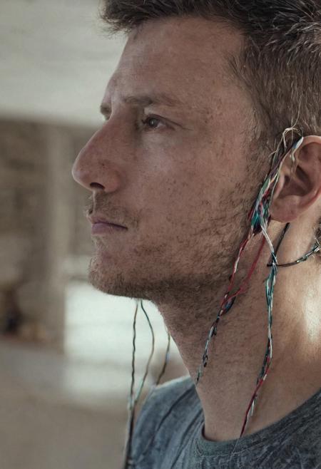 Side view portait of a man half human and mecanical,  cables like veins, multicolor,
Wide range of colors., Dramatic,Dynamic,Cinematic,Sharp details
Insane quality. Insane resolution. Insane details. Masterpiece. 32k resolution.