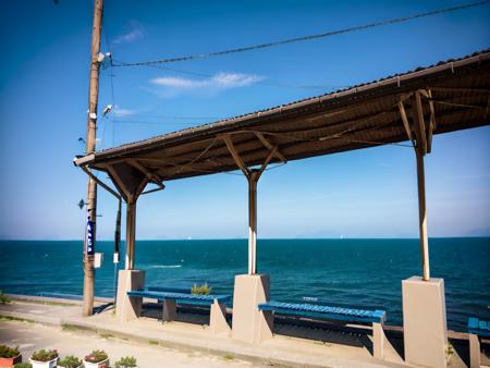 masterpiece, best quality, ultra-detailed, illustration,
shimonadaeki1, outdoors, scenery, day, sky, ocean, blue sky, horizon, power lines, water, utility pole, beach, train station, realistic, , photo background, , photo (medium), , photorealistic, real world location
 <lora:ShimonadaEki_V4:1>