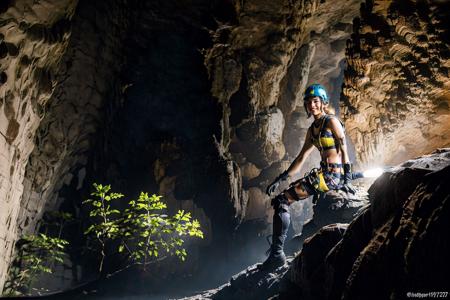 <lora:sondoong-000010:0.8>, cave, sondoong, plant, ((Helmet, Headlamp, Knee pads, Gloves, Boots, Climbing gear, Harness, )), 
1girl, a stunning photo with beautiful saturation, ultra high res,(realistic:1.4)),deep shadow,(best quality, masterpiece), pale skin, dimly lit, shade, flustered, blush, highly detailed, ((upper body:0.8)), skinny, BREAK depth of field, film grain, wrinkled skin, looking at viewer, knee,  warm smile,, (masterpiece,best quality:1.5)