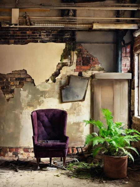 a plum chair sitting in front of a brown brick wall with a plant growing out of it's back, Claire Hummel, overgrown, a still life, neoplasticism<lora:Abandoned:1>