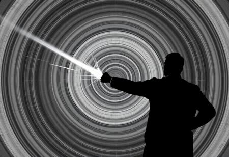 A chrome and silver beam hitting a human 100 metres away. The beam is about 1 metre thick and surrounded by multiple concentric grey and white circles of varying diameter. The target is silhouetted and is in an action hero pose