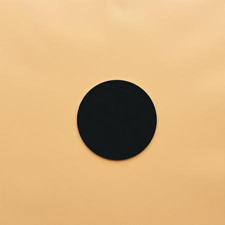 Round black circle on loose leaf paper