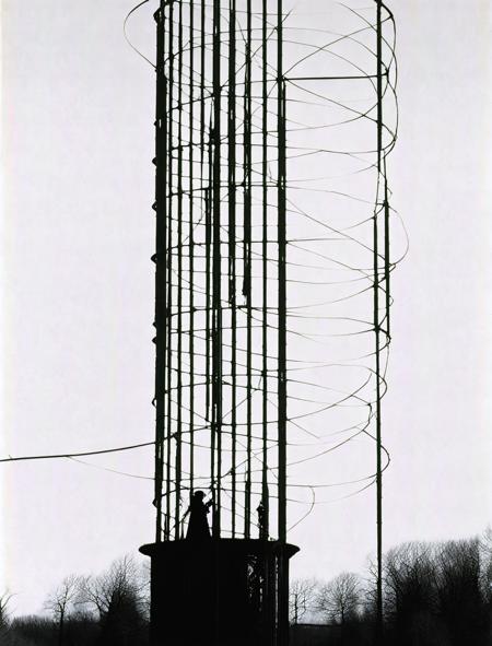 goth girl standing in front of a large metal structure, art by hbech