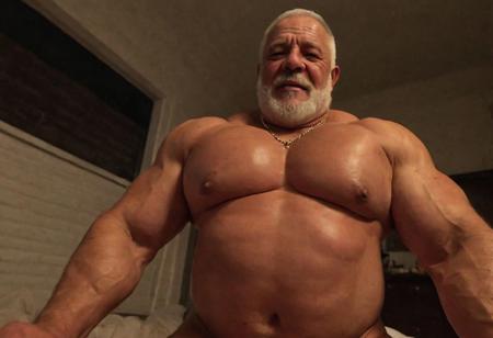 (photo, realistic, raw), (nighttime, at night, dark, dark hard shadows, cinematic atmosphere, movie grain, hazey atmosphere), medium shot, gay porn, gay sex scene, closeup from below, focus on face,pov / erotic / pornographic / lying on a bed / being fucked (brute, strongman, priest, european monk, cleric, holy, angelic, wise, gentleman, etherial, spiritual, emperor, king, god), old burly buff gentleman, goatee, old manly mature man, combed back hair,  doublechin, old tanned grandpa, wrinkly neck, proud big chest, thick neck, armpits, tanned skin, tight golden spandex, gold jewellery, gold necklace, in a dark cloister bedroom at night, nighttime,looking directly at viewer with a loving caring smile, leaning forward close to viewer, very close, intimite situation, romantic atmosphere, intimate lustful romantic expression, sad expression, belly and pecs from below, sweaty oily oiled skin