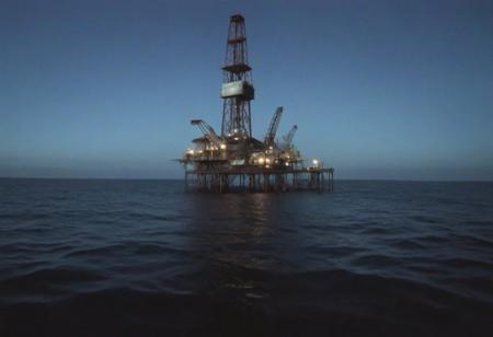 saturated camcorder 90s camera quality VHSfootage, liminal space oil rig with a dark tone, oil rig,shark, ocean, fisheye lens, harsh lighting, cinematic pale lighting, weirdcore,