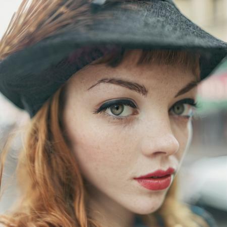 <lora:nicolelaliberte_xl_lora:1> nicolelaliberte a close up portrait photo of a beautiful 26 y.o woman in a paris cafe, wearing vintage clothing, moody, vines, organic, modern, (high detailed skin:1.2), 8k uhd, dslr, soft lighting, high quality, film grain, Fujifilm XT3